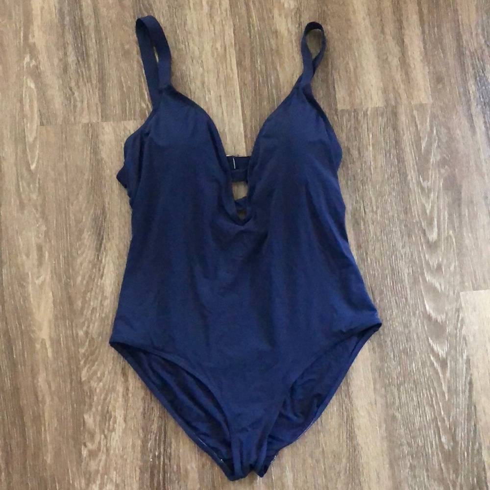 Calvin Klein, navy blue one piece, never worn